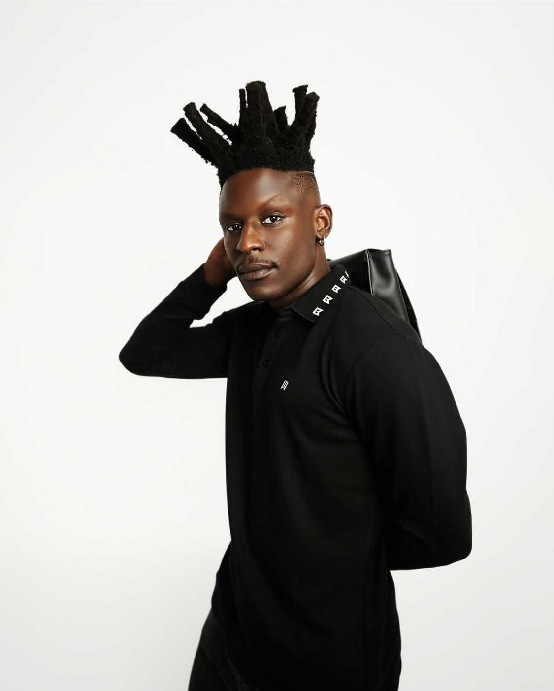 Black signature long sleeve polo
