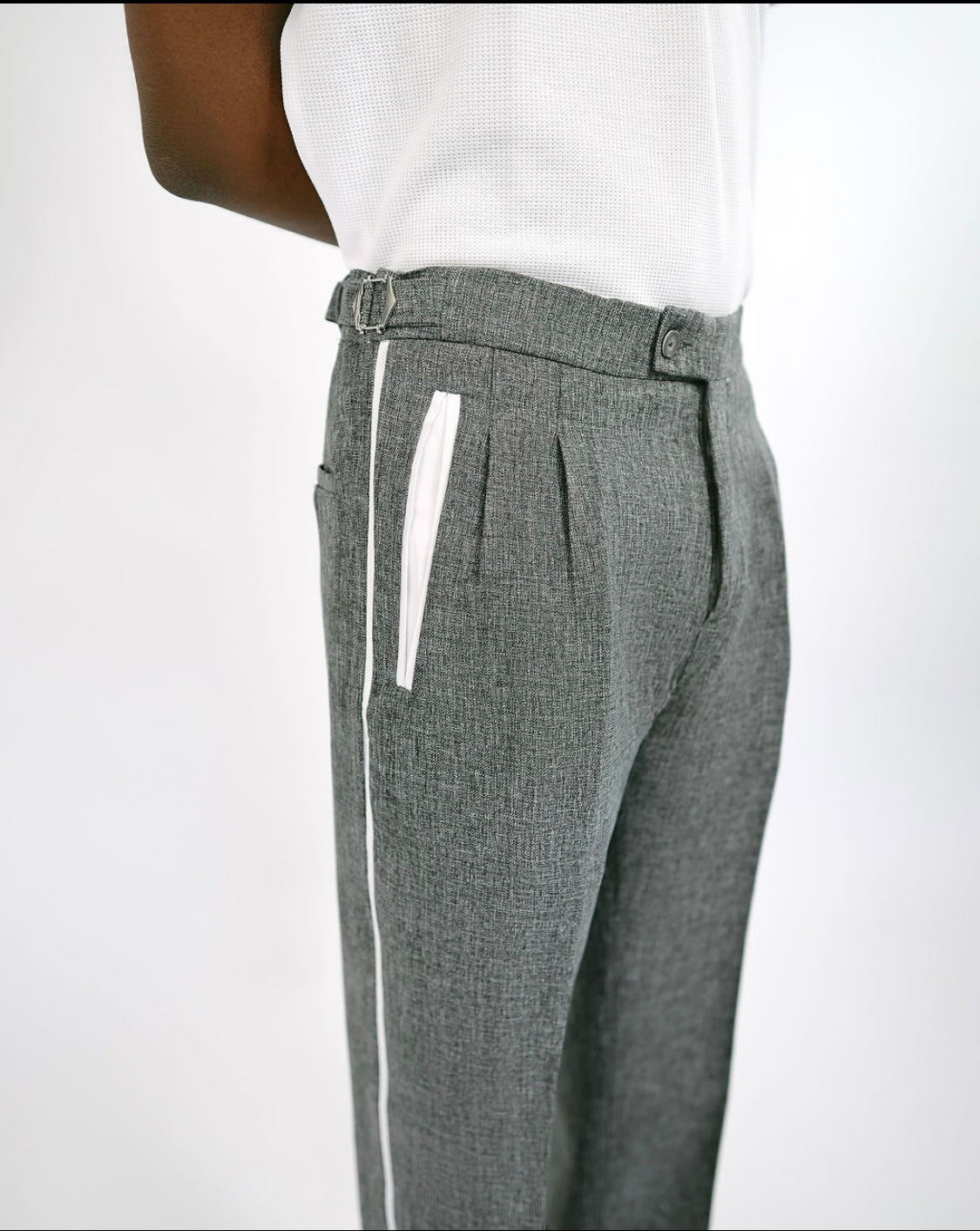 Grey loose fit textured pants with side stripe