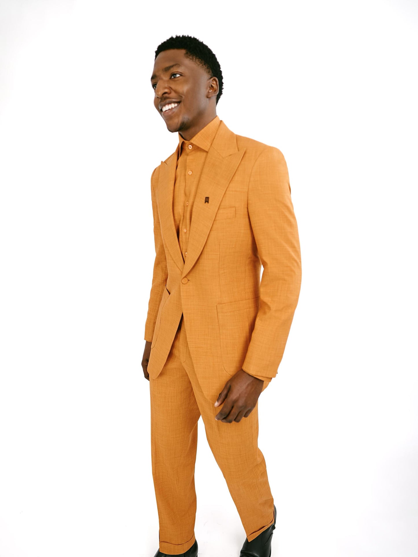 Orange three piece suit