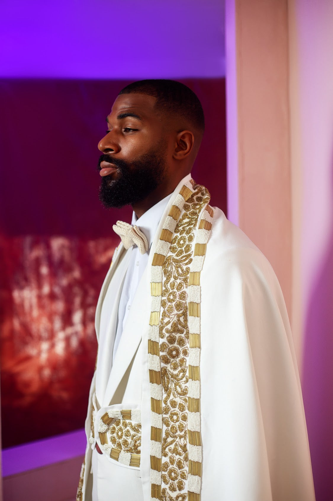 White three piece gold embellished cloak