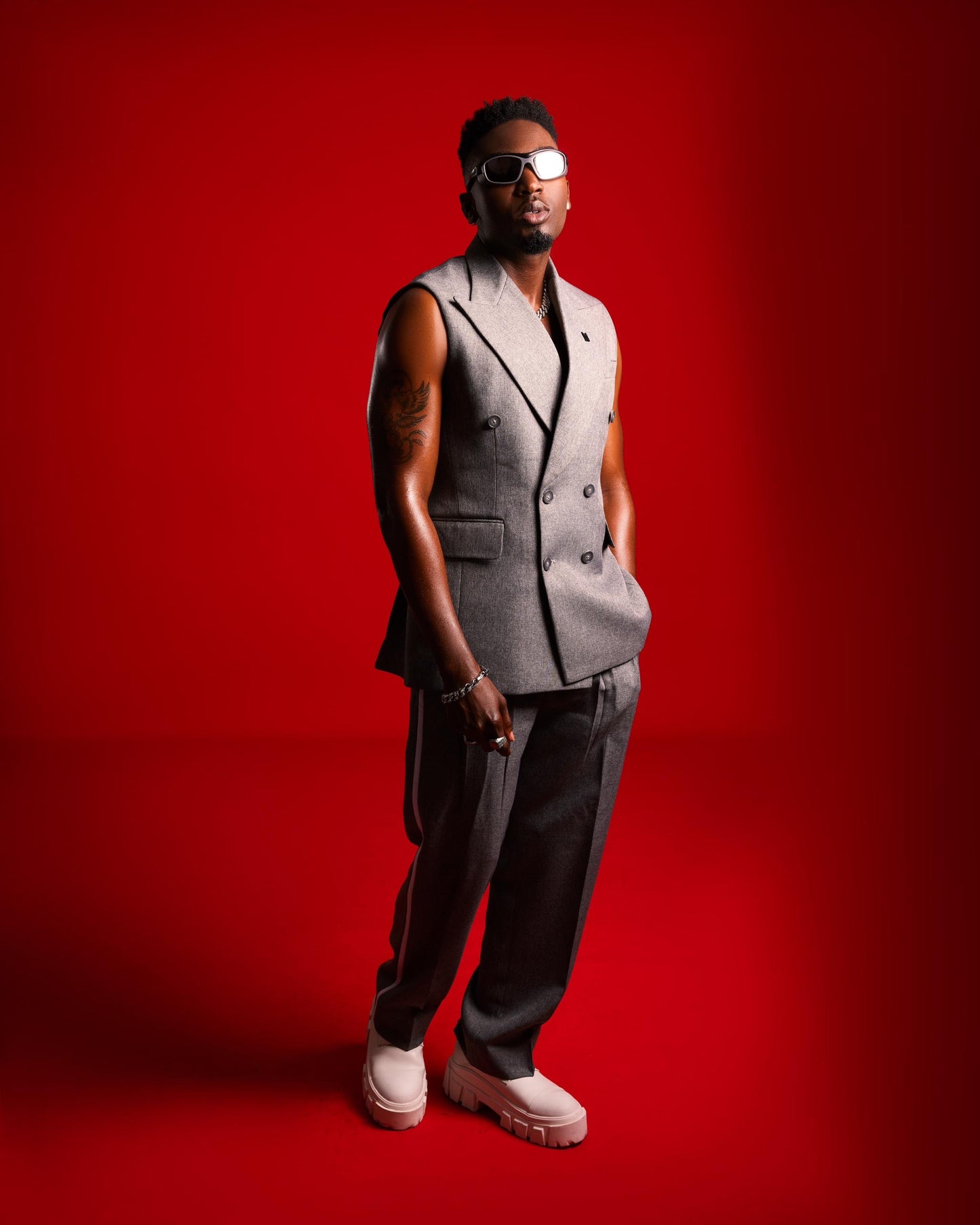 Grey sleeveless double breasted two piece suit