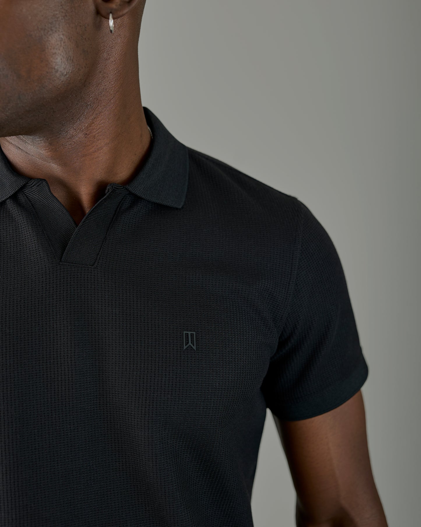 Black knitted vneck polo shirt