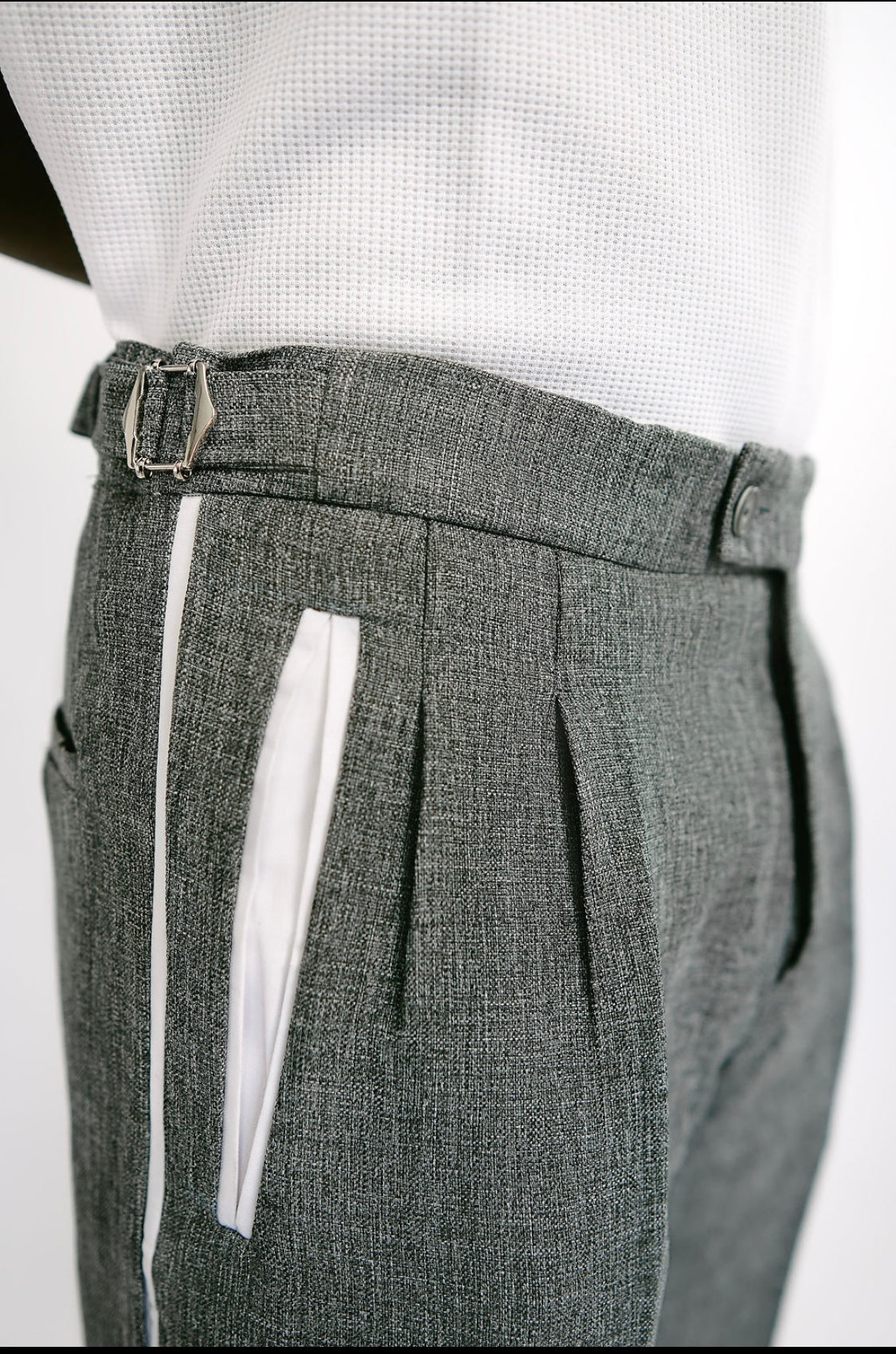 Grey loose fit textured pants with side stripe