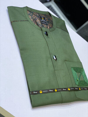 Green long sleeve Native with embroided pockets.
