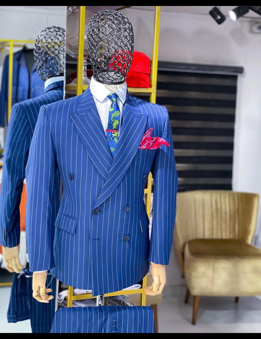 Midnight blue pin stripped double breasted peak lapel suit