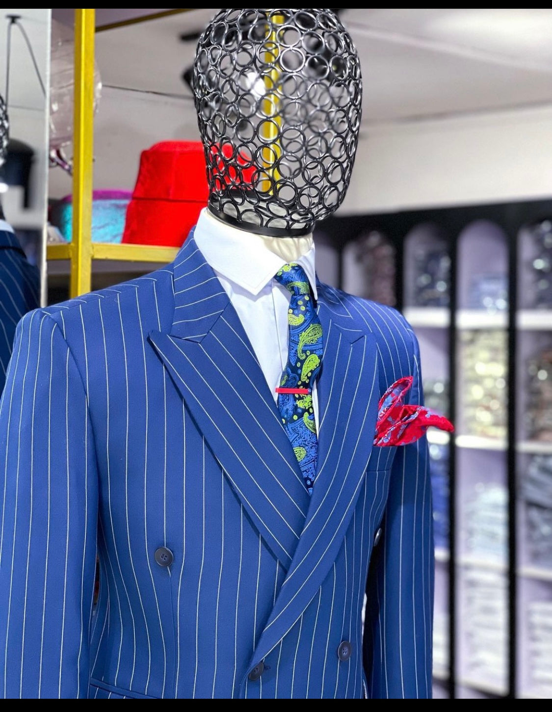 Midnight blue pin stripped double breasted peak lapel suit