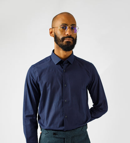 Navy blue dotted long sleeve shirt.