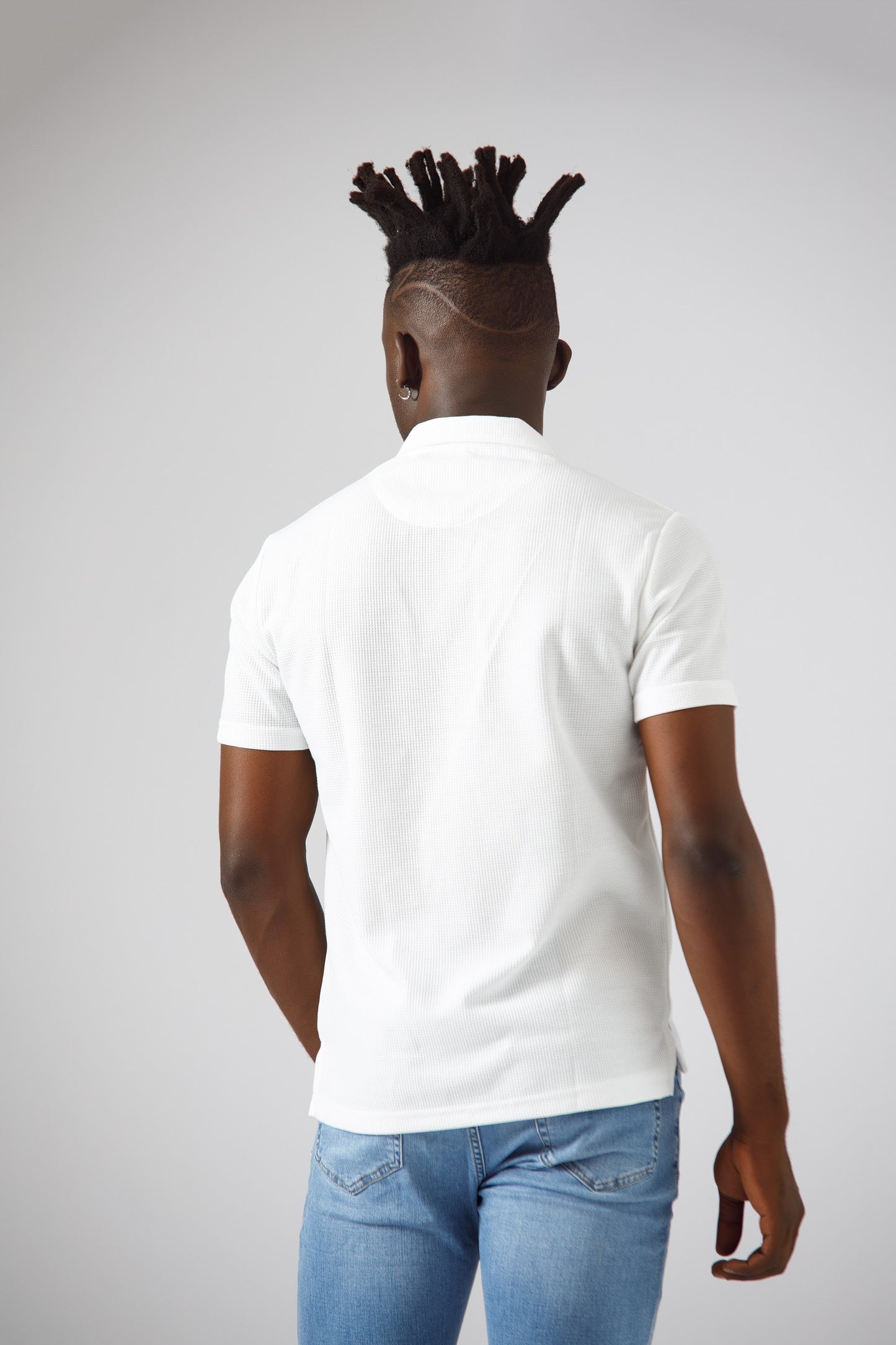 White knitted polo